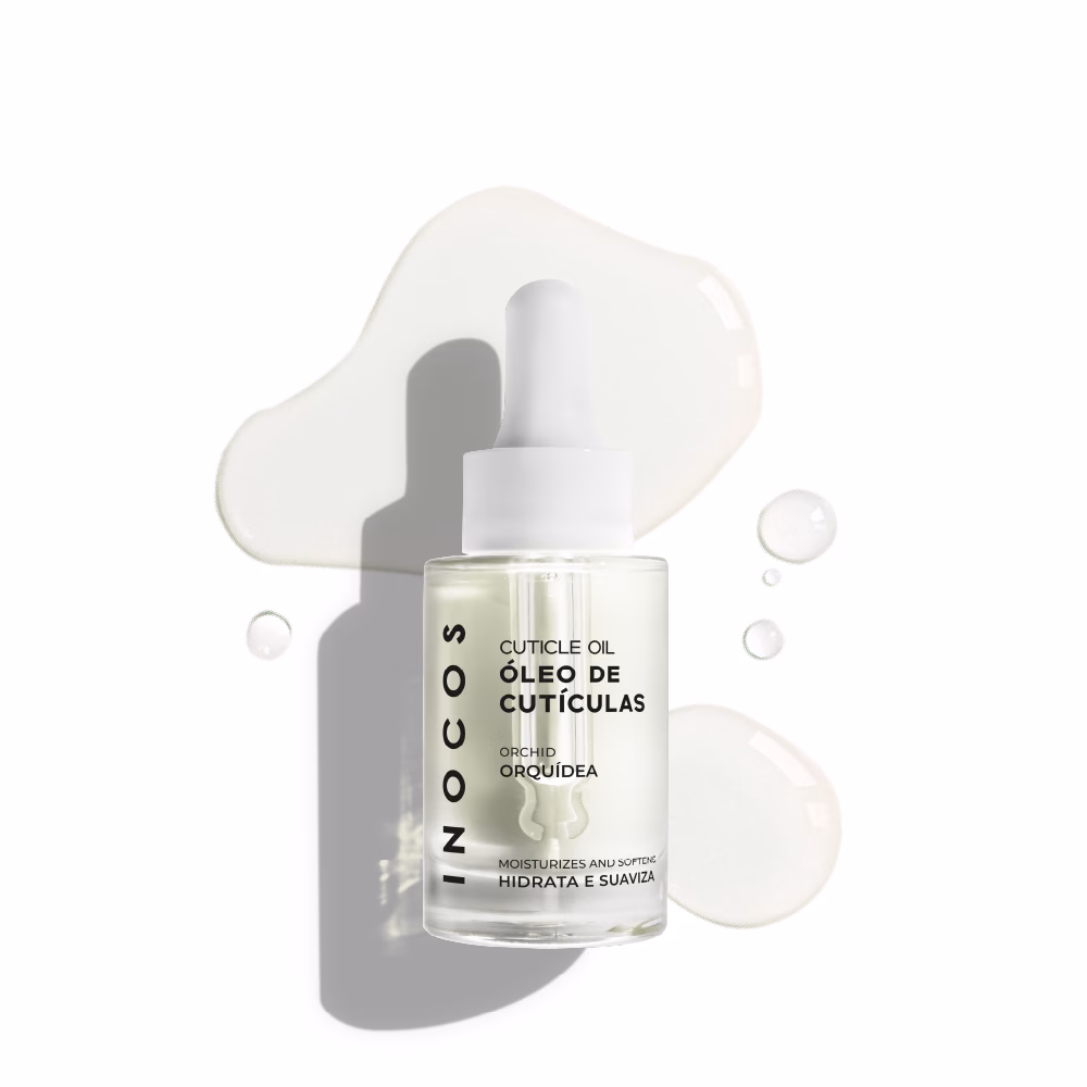 INOCOS - Óleo de Cutículas de Orquídea 15ml Cutículas saudáveis e hidratadas. REF. 91.10.053 Nutre e hidrata as tuas cutículas com o Óleo de Cutículas INOCOS de Orquídea. Com óleo de amêndoas doces, ter as cutículas saudáveis nunca foi tão fácil. Detalhes: Quantidade: 15ml Modo de uso: Após a finalização da unha aplicar 1 gota de Óleo de Cutículas junto à cutícula e massajar até que seja absorvido.